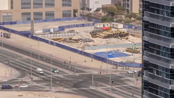 Bussy traffic on the road intersection in Dubai business bay district aerial timelapse, UAE — Stock Video