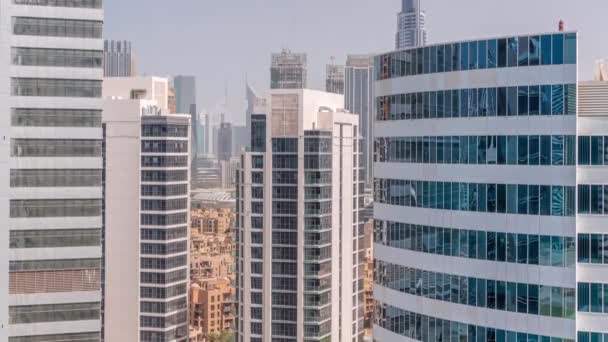 Mrakodrapy v Dubaji Business Bay a finanční okrsek letecké timelapse. — Stock video