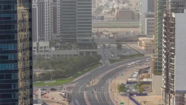 Dubai business bay towers op dag tijd luchtfoto timelapse. — Stockvideo