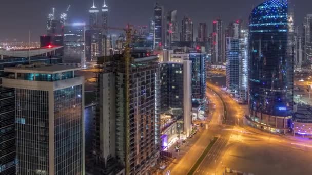 Dubai business bay torres noche timelapse aérea — Vídeos de Stock