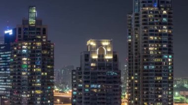 Dubai Yat Limanı gece timelapse, Glittering ışıklar ve en yüksek gökdelenler
