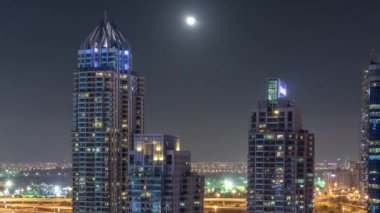 Dubai Yat Limanı gece timelapse, Glittering ışıklar ve en yüksek gökdelenler