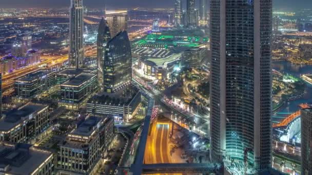 Downtown Dubai dag till natt timelapse moderna torn panoramavy från toppen i Dubai, Förenade Arabemiraten. — Stockvideo