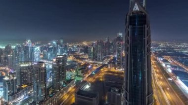 Panoramik Dubai, Suudi Arabistan, üstten Dubai Downtown gece timelapse modern kuleleri.