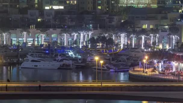 Water canal on Dubai Marina skyline at night timelapse. — Stock Video