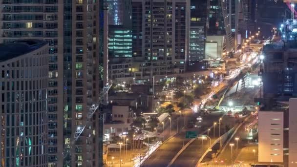 Downtown Dubai nacht timelapse moderne towers uitzicht vanaf de top in Dubai, Verenigde Arabische Emiraten. — Stockvideo