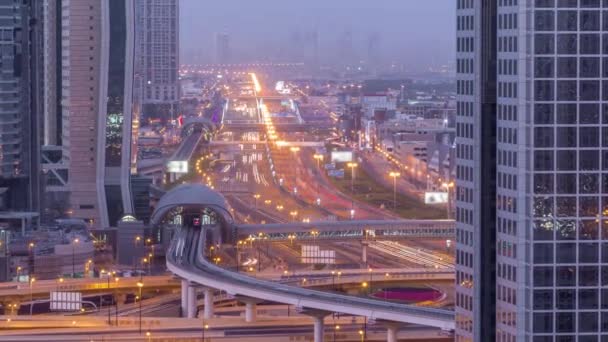 Dubai downtown skyline night to day timelapse and Sheikh Zayed road traffic, UAE — Stock Video