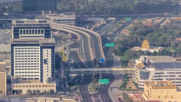 Wolkenkrabbers en andere gebouwen in de buurt van het Dubai World Trade Center district in Dubai luchtfoto timelapse — Stockvideo