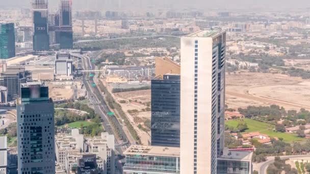 Aerial view of skyscrapers under construction in Dubai timelapse. — Stock Video