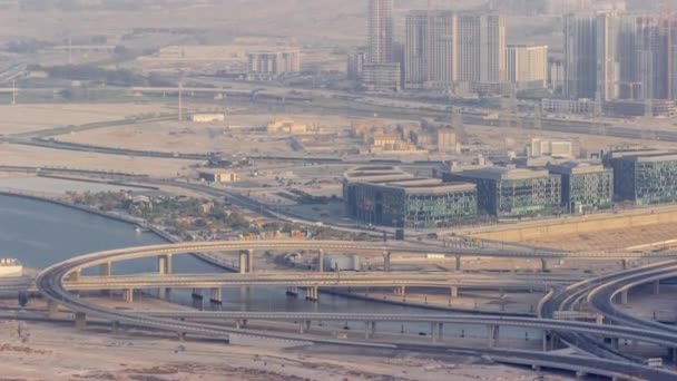 Bussy traffic on the overpass intersection in Dubai downtown aerial timelapse. — Stock Video