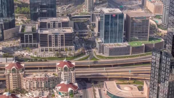 Bussy traffic on the overpass intersection in Dubai downtown aerial timelapse. — Stock Video