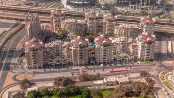 Bussy traffic on the overpass intersection in Dubai downtown aerial timelapse. — Stock Video