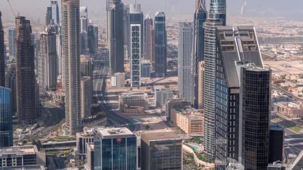Downtown skyline met moderne architectuur vormen vooral de hele dag timelapse. Luchtfoto van Dubai business bay torens. — Stockvideo
