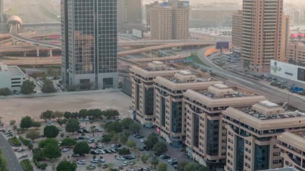 Widok z lotu ptaka na Dubai International Financial District z wieloma drapaczami chmur timelapse. — Wideo stockowe
