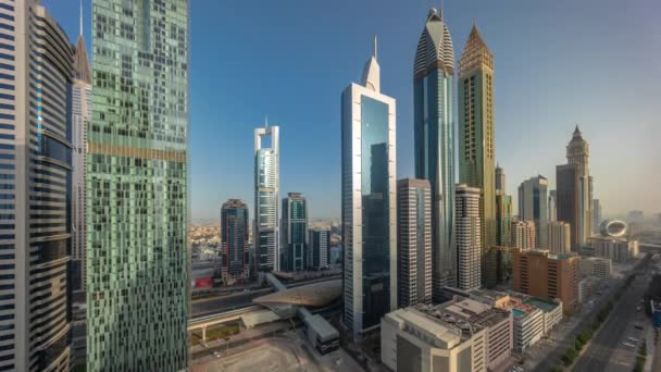 Vista aérea do Dubai International Financial District com muitos arranha-céus timelapse. — Vídeo de Stock