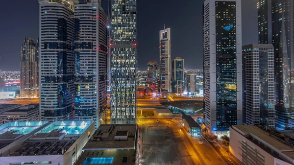 Εναέρια Πανόραμα Της Διεθνούς Οικονομικής Περιοχής Ντουμπάι Πολλούς Ουρανοξύστες Νύχτα — Φωτογραφία Αρχείου