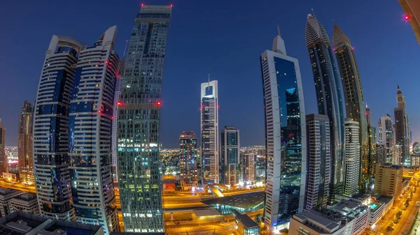 Πανόραμα Της Διεθνούς Οικονομικής Περιοχής Ντουμπάι Πολλούς Ουρανοξύστες Νύχτα Την — Φωτογραφία Αρχείου