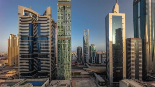 Flygfoto över Dubai International Financial District med många skyskrapor timelapse. — Stockvideo