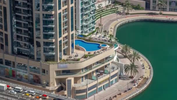 Dubai Marina waterfront and city promenade timelapse from above. — Stock Video