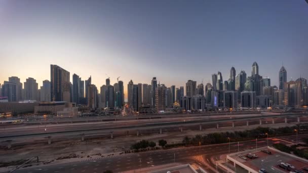 Dubai marina bloco mais alto de arranha-céus dia a noite timelapse. — Vídeo de Stock