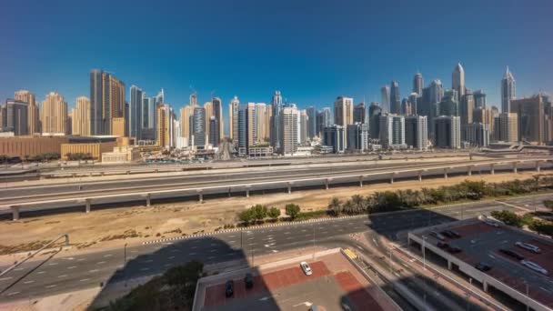 Dubai jachthaven hoogste blok van wolkenkrabbers hele dag timelapse. — Stockvideo