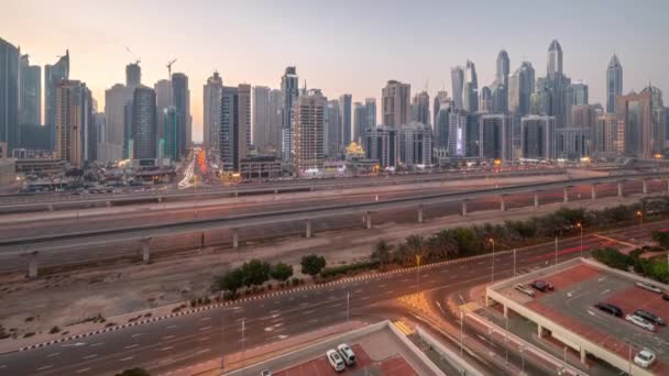 Dubai marina bloque más alto de rascacielos día a noche timelapse. — Vídeos de Stock