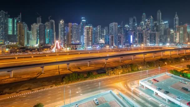 Dubai marina tallest block of skyscrapers all night timelapse. — Stock Video
