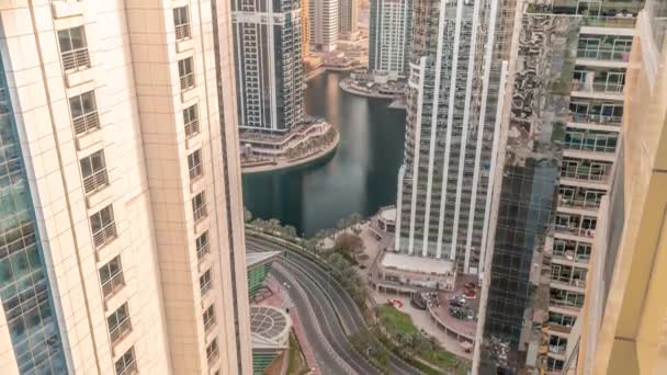 Tall residential buildings at JLT aerial timelapse, part of the Dubai multi commodities centre mixed-use district. — Stock Video