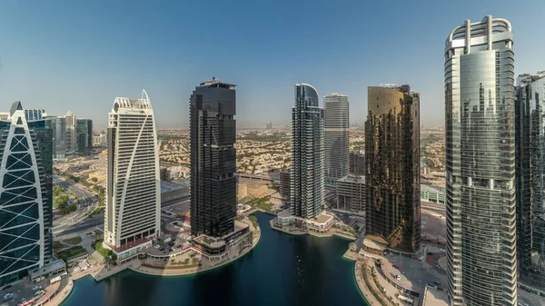 Tall residential buildings at JLT aerial timelapse, part of the Dubai multi commodities centre mixed-use district. — Stock Photo, Image