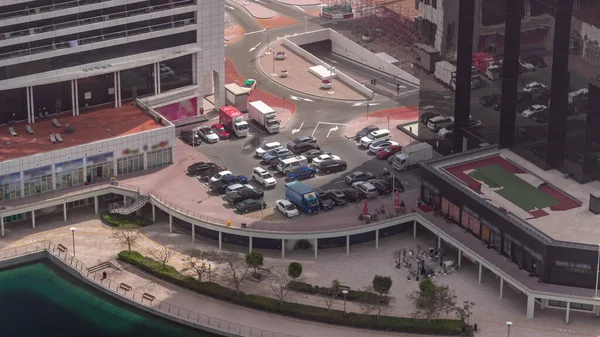 Estacionamento em beira-mar visto de cima durante todo o dia timelapse, vista aérea. — Fotografia de Stock