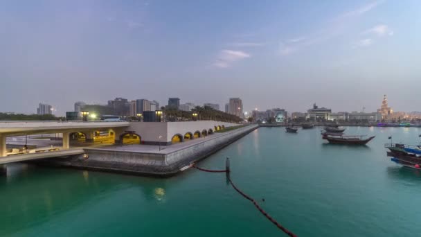 View of the Doha city in front of the Museum of Islamic Art day to night timelapse in the Qatari capital, Doha. — Stock Video