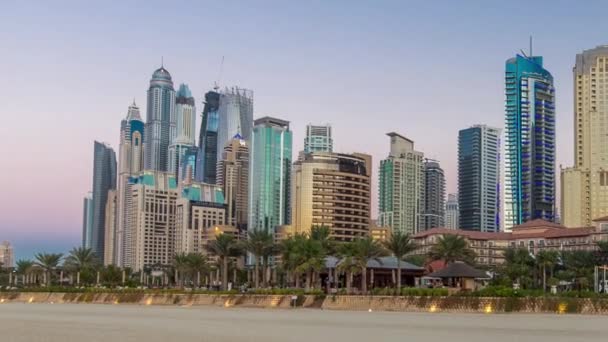 Modern skyscrapers day to night timelapse in jumeirah beach residence in Dubai, JBR — Stock Video