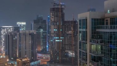 Dubai gökdelenleri iş sahasındaki aydınlatmalı bölge gece zaman çizelgesi.