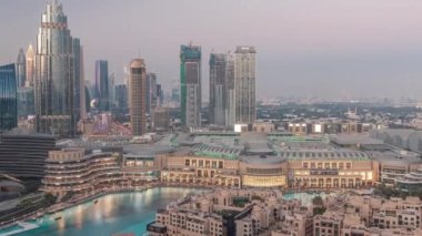 Dubai Uluslararası Finans Merkezi 'nin gündüz-gece hava görüntüsü