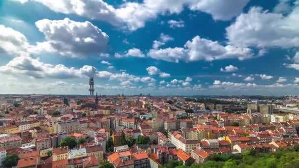 Timelapse view from the top of the Vitkov Memorial on the Prague landscape with the famous Zizkov TV tower on the horizon — ストック動画