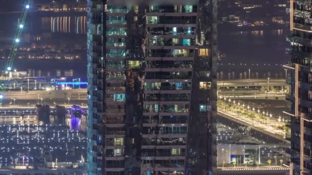 Canal in Dubai Marina with luxury skyscrapers around night timelapse, United Arab Emirates — Stock Video