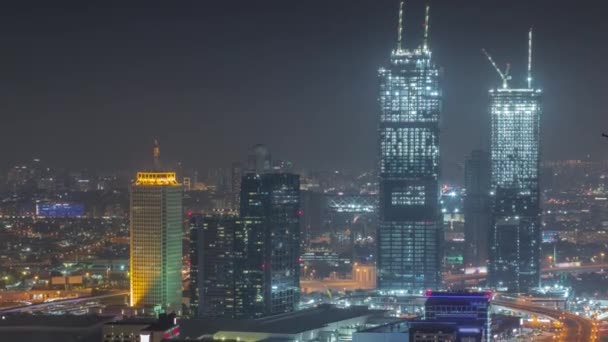 Vista aerea dei grattacieli con il World Trade Center a Dubai notte timelapse. — Video Stock
