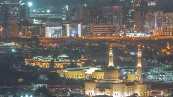 Letecký pohled na Bur Dubaj, potok, okres Deira a noční čas Sharjah — Stock video