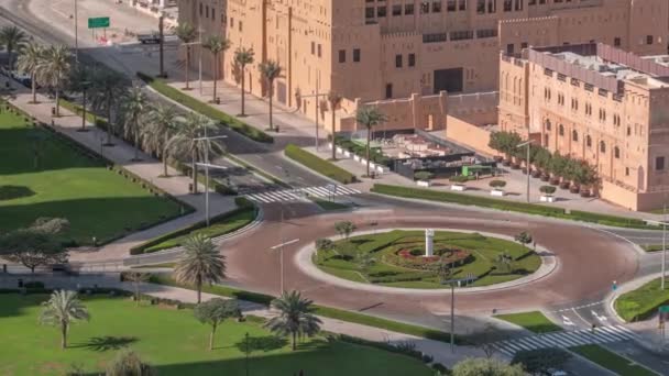 Aerial view of a roundabout circle road intersection in Dubai downtown from above timelapse. — Stock Video