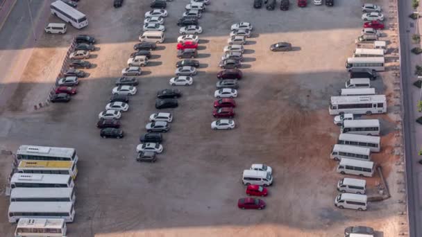 Aerial view of a parking lot with many cars in rows timelapse — Stock Video