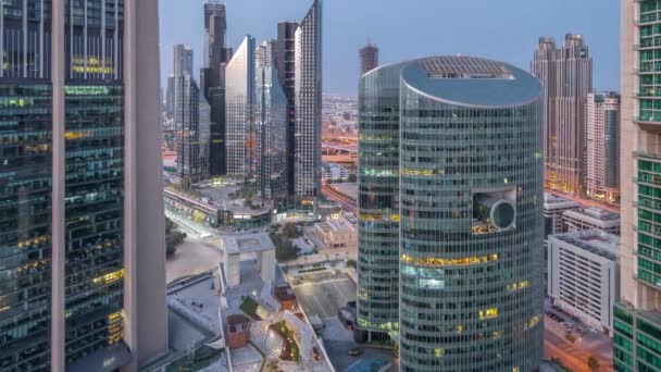 Dubai International Financial Center drapacze chmur powietrzne noc po dniu timelapse. — Wideo stockowe