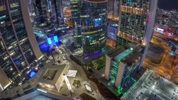 Dubaj mezinárodní finanční centrum mrakodrapy antény celou noc timelapse. — Stock video