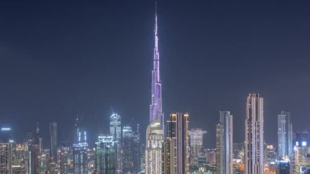 Panoramiczna panorama Dubaju z zatoką biznesową i centrum dzielnicy nocnej timelapse. — Wideo stockowe