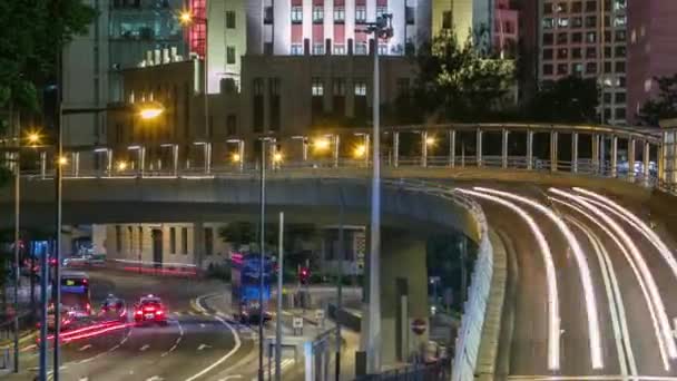 Distretto degli affari di Hong Kong con traffico occupato timelapse di notte. — Video Stock