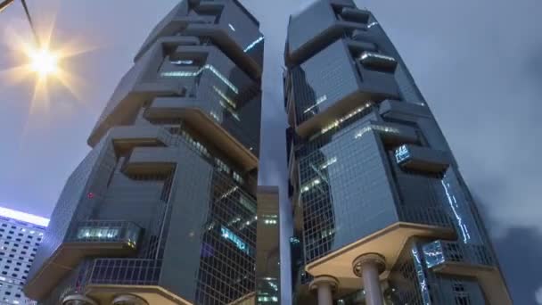 La noche de Hong Kong Corporate Buildings timelapse hiperlapso — Vídeos de Stock