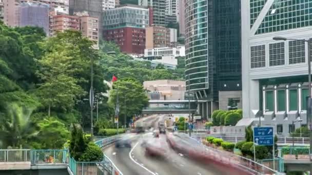Hong Kong timelapse de tráfego perto de torre de banco no distrito Central de Hong Kong. — Vídeo de Stock