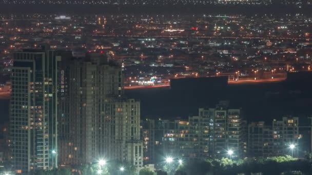 Vue aérienne de la zone du quartier des verts timelapse nocturne de la marina de Dubaï. — Video