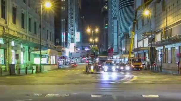 Luces de neón en la calle Tsim Sha Tsui hiperlapso timelapse con el tráfico cerca de Pehinsula . — Vídeos de Stock