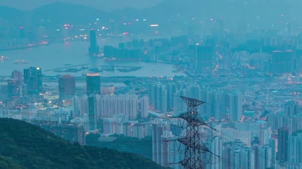 香港城市景观天际线由飞农山至九龙山顶一带夜以继夜的流逝. — 图库视频影像