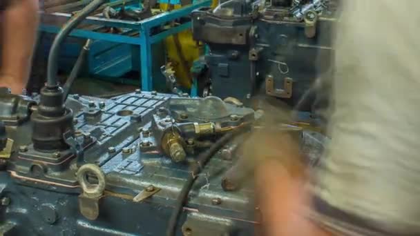 Tractor engine assembled on the factory production line on tractor factory timelapse — Stock Video